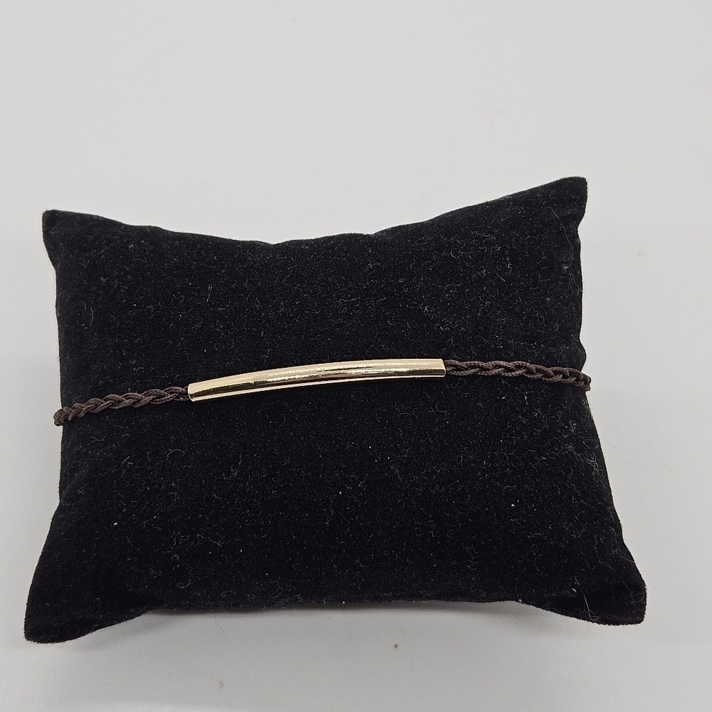 thin brown cord bracelet with gold tone slider bar